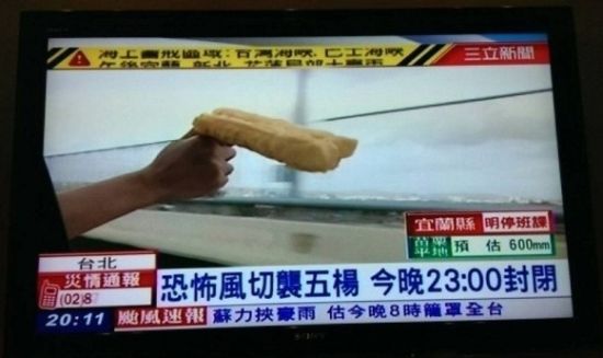 拿油条测风速图片