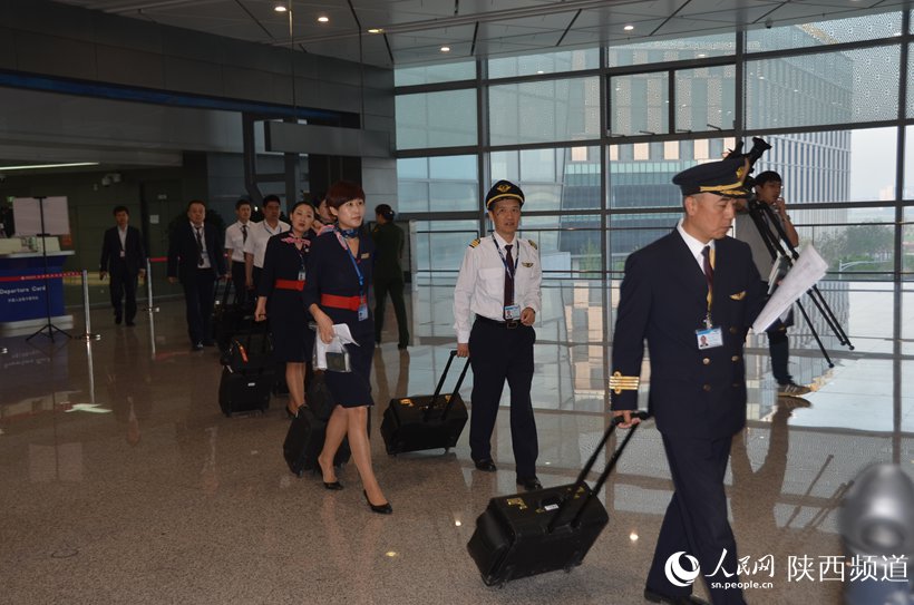 国际指廊投入使用 咸阳机场出境航班转T3(组图