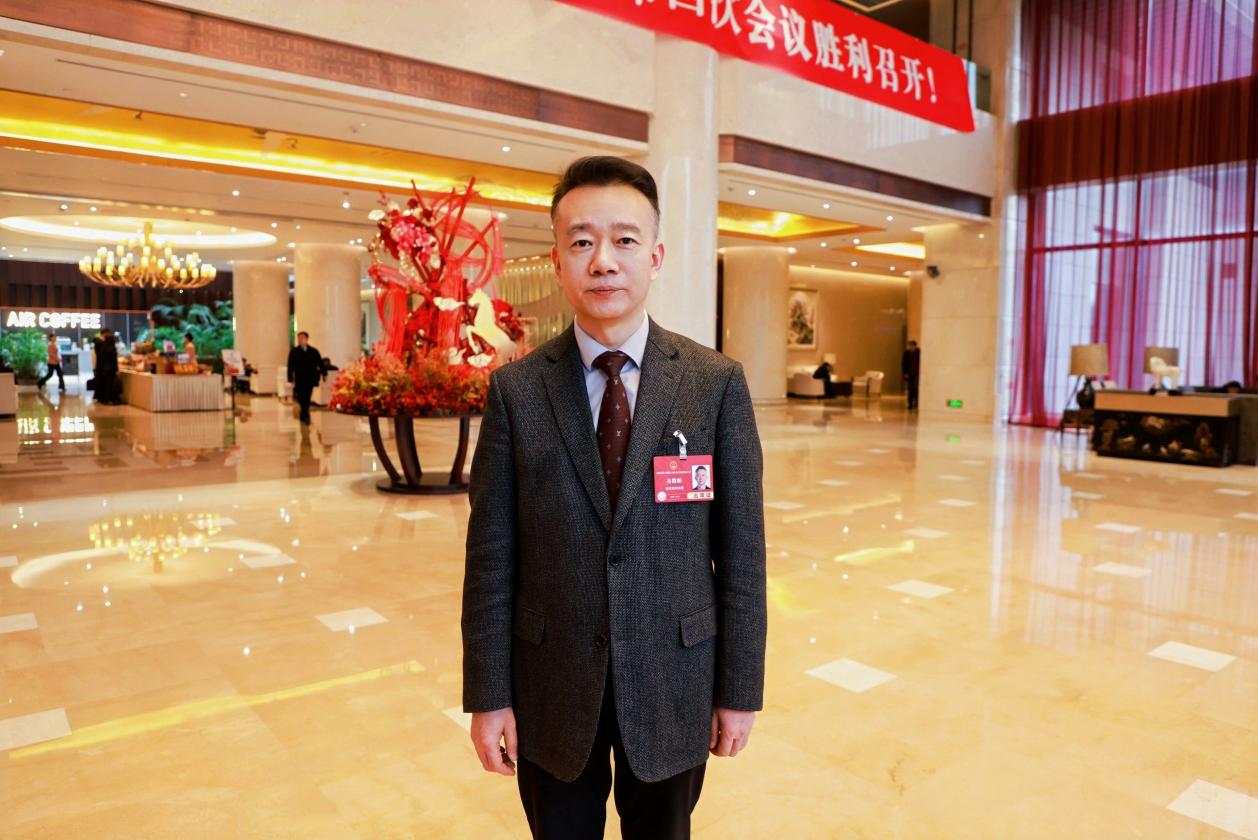 陕西省人大代表、西安市人民医院（西安市第四医院）院长石胜彬在陕西省两会现场。受访者供图